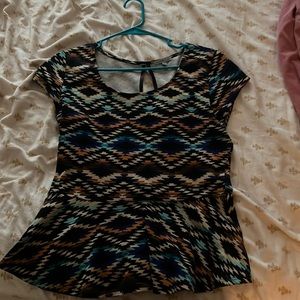 This is a cute, flirty top that gives hourglass look!